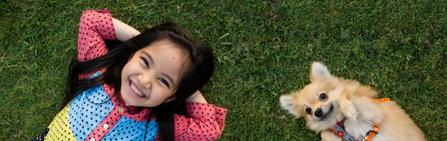 Landscapes Home Image - Girl Comfy On fresh mowed grass with puppy